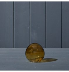 Introduce some colour to your home decor with our Yellow Globe Glass Vase.