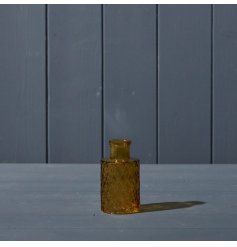 Introducing our stunning Yellow Geometric Glass Bottle, measuring at 9.2cm in height.