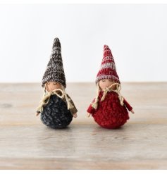 A collection of two charming fabric dolls in brown and white, featuring sherpa bodies and knitted hats.