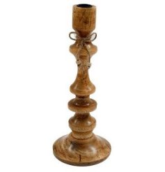 A charming wooden candle stick made from mango wood. Complete with a jute bow.