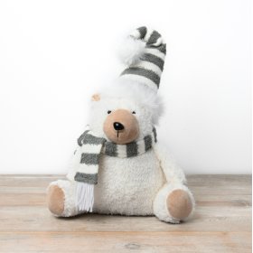 "Get ready for a winter wonderland with our charming Polar Bear Decoration ❄️ Made with soft fabric and sporting a