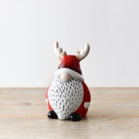 Celebrate the holidays in style with our charming Standing Red Santa. Complete with a festive deer hat!