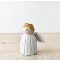 Keep your loved ones near with this angel candle stick holder