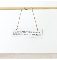 A dainty and meaningful ceramic hanger with the words "I can't say I love you enough... so this is your little reminder"