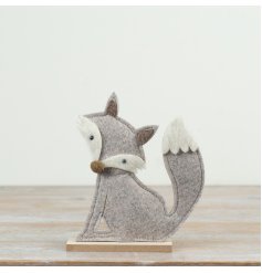 This simplistic fox made from felt details all of the neutrals making it a great item for most home decor styles.