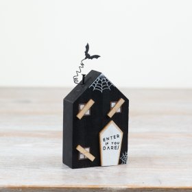 Enter if you dare! A stylish halloween themed wooden house with spooky details. 