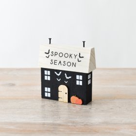 Dress the home during spooky season with this unique and wonderfully crafted wooden house block. 