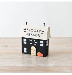 A unique halloween house block with hand painted details, 3D elements and a SPOOKY SEASON slogan. 