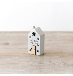 A must have miniature wooden house block with HOCUS POCUS slogan and charming 3D details. 