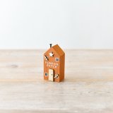 A must have miniature wooden house with pumpkin patch slogan and charming 3D spooky details.