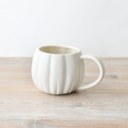 Get in the Halloween spirit with this cute white pumkin shaped mug.