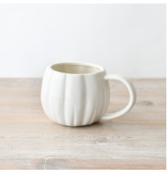 Get in the Halloween spirit with this cute white pumkin shaped mug.