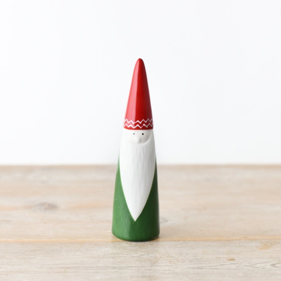 Add a touch of holiday cheer to your home décor with this chic and modern Santa decoration. 