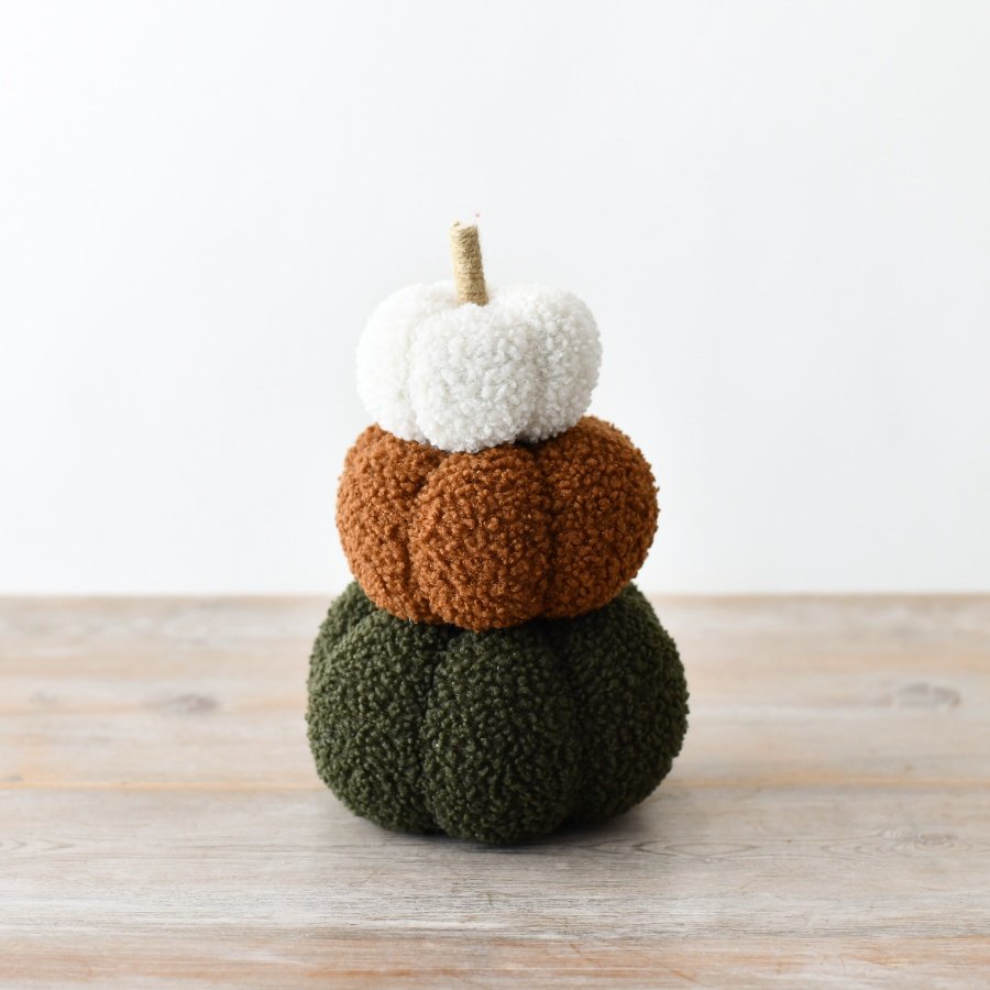 A richly coloured pumpkin stack made from a beautifully textured sherpa fabric.