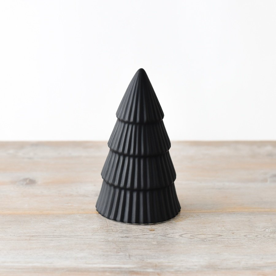 Elevate your holiday decor with our striking Matt Black Tree Ornament, adding an elegant touch of sophistication.