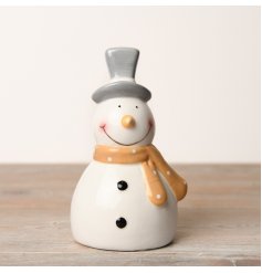 Add festive charm to your home with this adorable snowman. Display solo or pair with other decor for a festive touch.