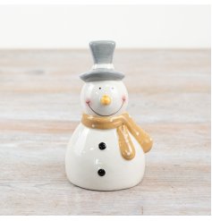 Add festive charm to your home with this adorable snowman. Display solo or pair with other decor for a festive touch.