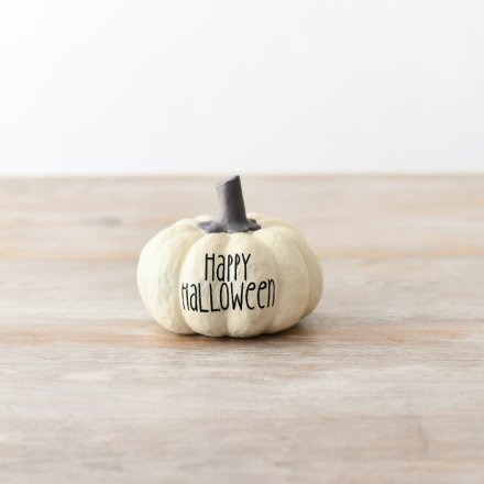 A cute white pumpkin ornament with the words 'Happy Halloween' engraved into it in black text.