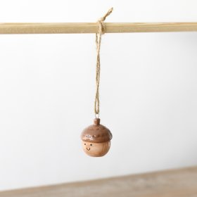 A delightful ceramic acorn decoration, complete with an endearing smiley face. 