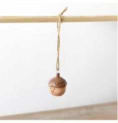 An adorable little ceramic acorn hanger featuring a cute smiley face. Great for adding character to any display