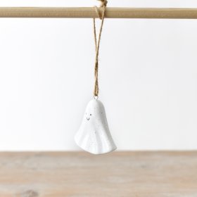 A charming and dainty ghost decoration adorned with a chic black speckle pattern and an endearing smile.