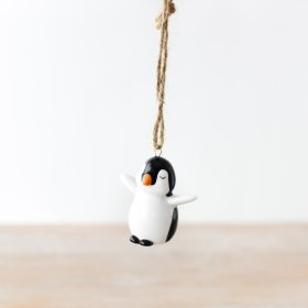 An adorable and delicate penguin hanger, a charming addition to any home during the holiday season.
