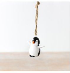 A small and delicate penguin hanger, a charming addition to any home during the holiday season.