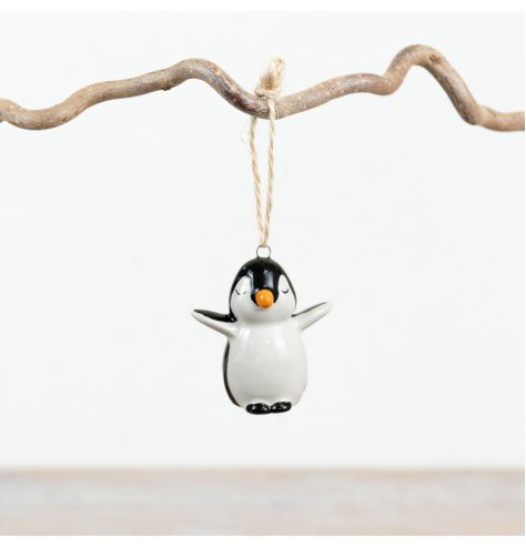 A dainty hanging penguin, a charming addition to any household during this festive time.