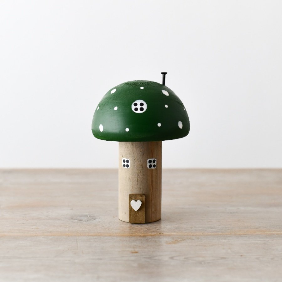 Get enchanted by our Wooden Green Mushroom House for a whimsical touch to your holiday decor. 