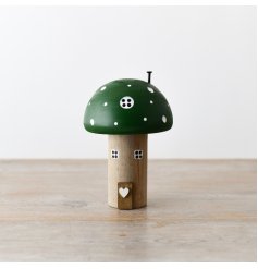 Enhance your holiday decorations with a delightful Wooden Green Mushroom House, imbued with enchanting woodland charm.