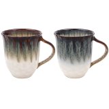 Introducing our new style of Reactive Glaze Mugs in a set of 2, perfect for adding a touch of elegance to your morning c