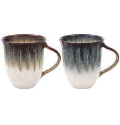 Our new style of Reactive Glaze Mugs in a set of 2. These mugs feature a stunning reactive glaze finish, creating a uniq