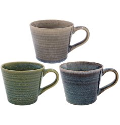 A functional and chic assortment of mugs with a striking reactive glaze finish.