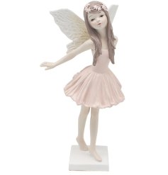 Bring a bit of fairy tale wonder into your world with this Fantasia Fairy with her arms flung back.