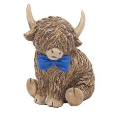 An adorable little highland cow ornament featuring a dainty blue bow tie
