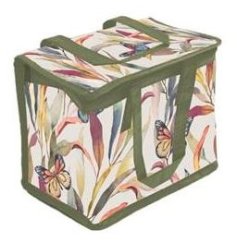 A stylish cooler bag featuring a colourful butterfly design with contrasting green piping. 