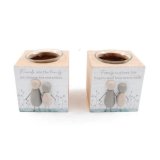 Add a touch of shabby chic to your home with these cute pebble family candle holders