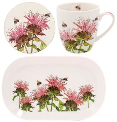 An exquisite set featuring a Bergamot design on a mug, coaster, and tray