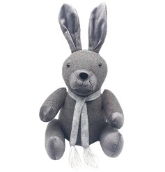 A sweet tweed rabbit doorstop with an adorable fabric scarf