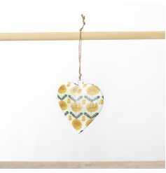 A stylish metal heart hanger with a wild flower design in a rich yellow hue. 