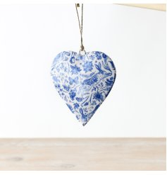 A chic hanging metal heart with a folk inspired hare pattern. 