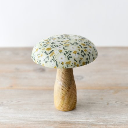 This unique mushroom ornament features a fun, springtime pattern.