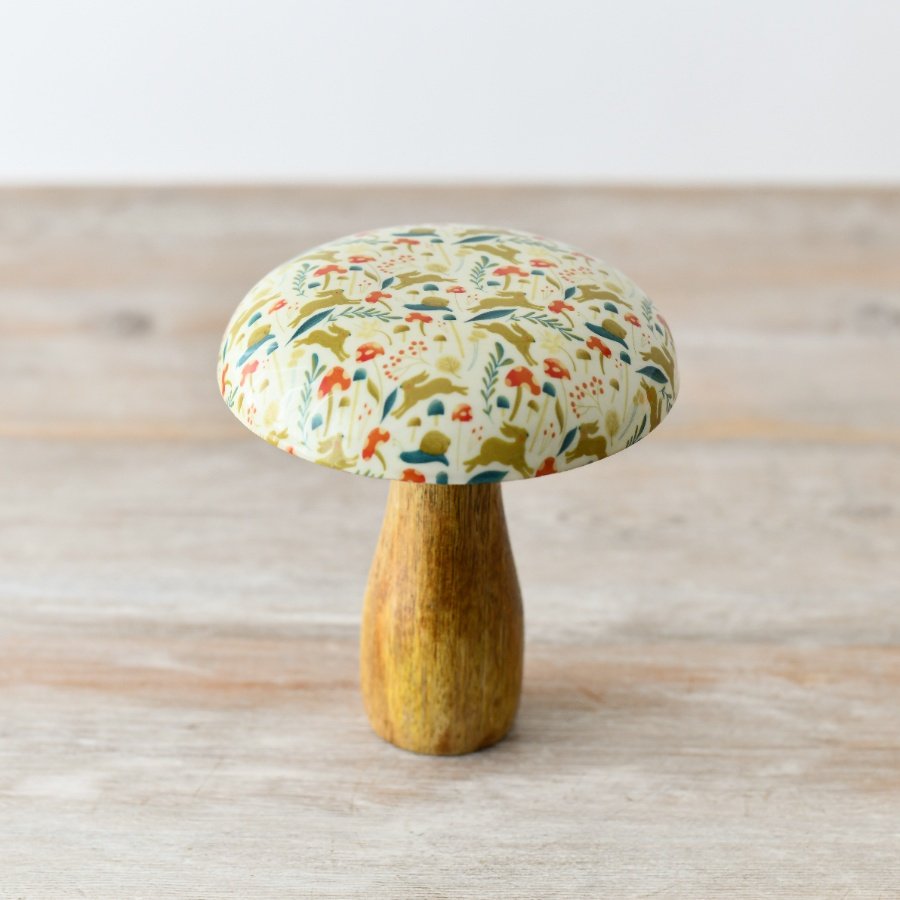 A charming woodland design mushroom featuring toadstools and jumping hares. 