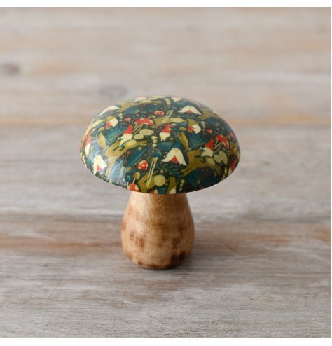 This enchanting woodland mushroom has been beautifully crafted. In rich green and red colours it details and abundance 