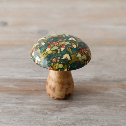A unique wooden mushroom decoration with a richly coloured woodland forrest design.