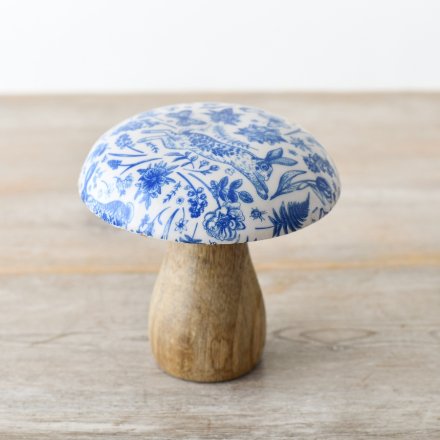 Decorate the home with this unique chunky wooden mushroom ornament with a decorative enamel cap.