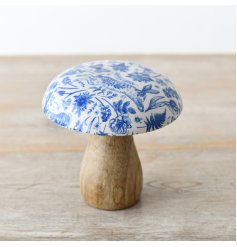 Decorate the home with this unique chunky wooden mushroom ornament with a decorative enamel cap.