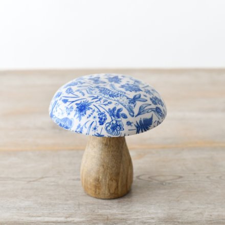 A charming mushroom ornament with a blue hare printed pattern. A unique interior accessory in a rich blue hue. 