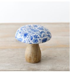A charming mushroom ornament with a blue hare printed pattern. A unique interior accessory in a rich blue hue. 