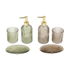 A stunning collection of bathroom essentials made of ribbed glass, featuring a soap tray, dispenser, and tumbler